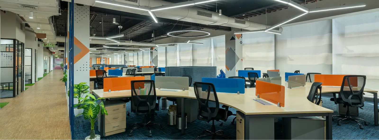 Modern open-plan office workspace at T&A Solutions